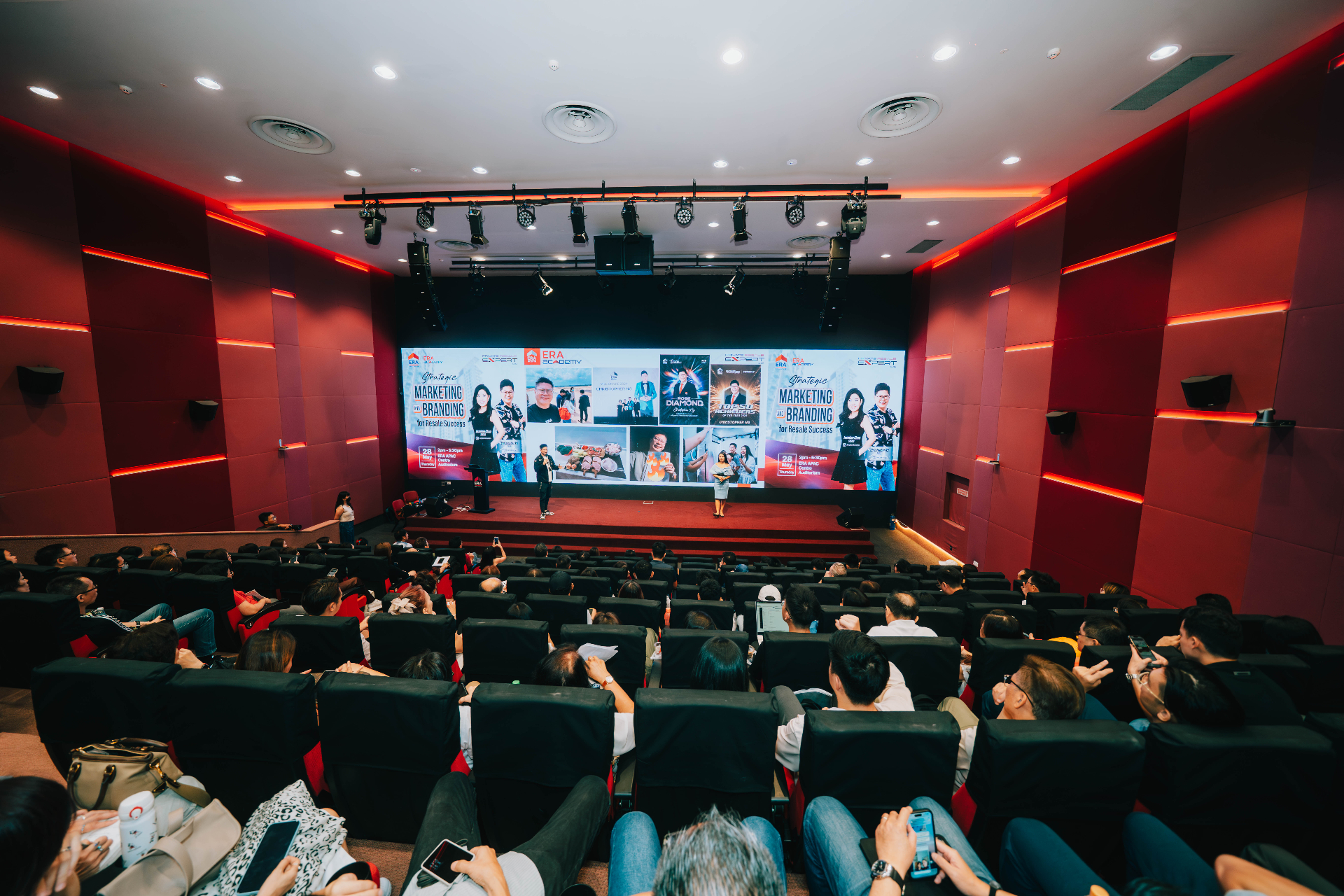 Christopher Ng and Jasmine Chan presenting at ERA APAC Centre auditorium to a packed audience