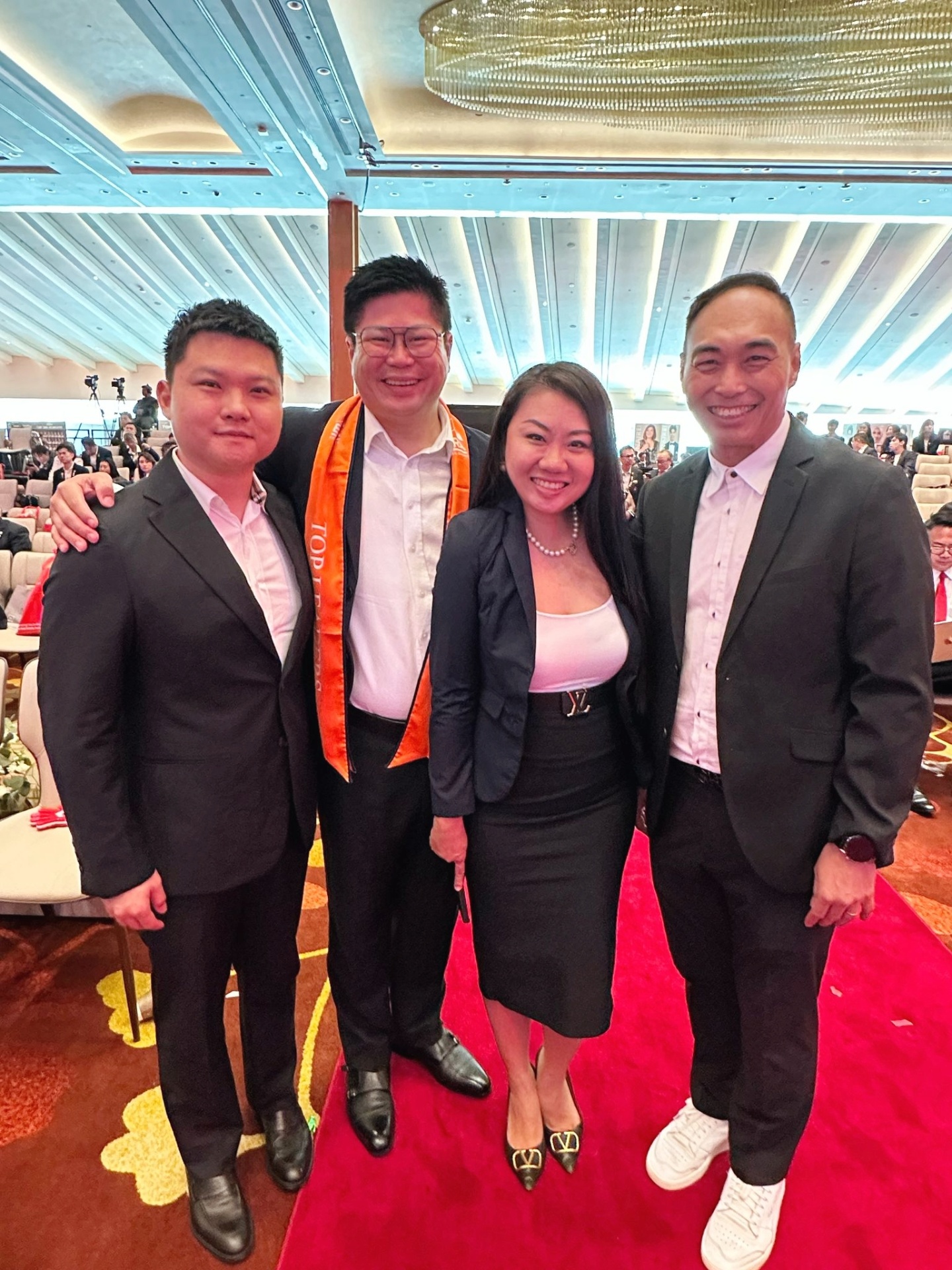 With team members at an ERA Top Producer ceremony