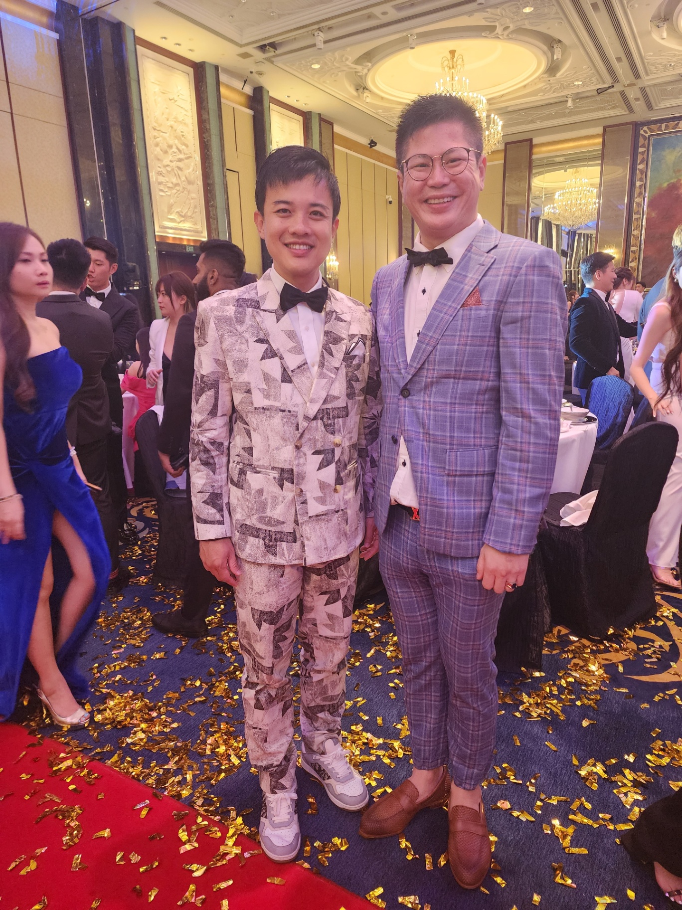 Christopher with a friend during a gala dinner